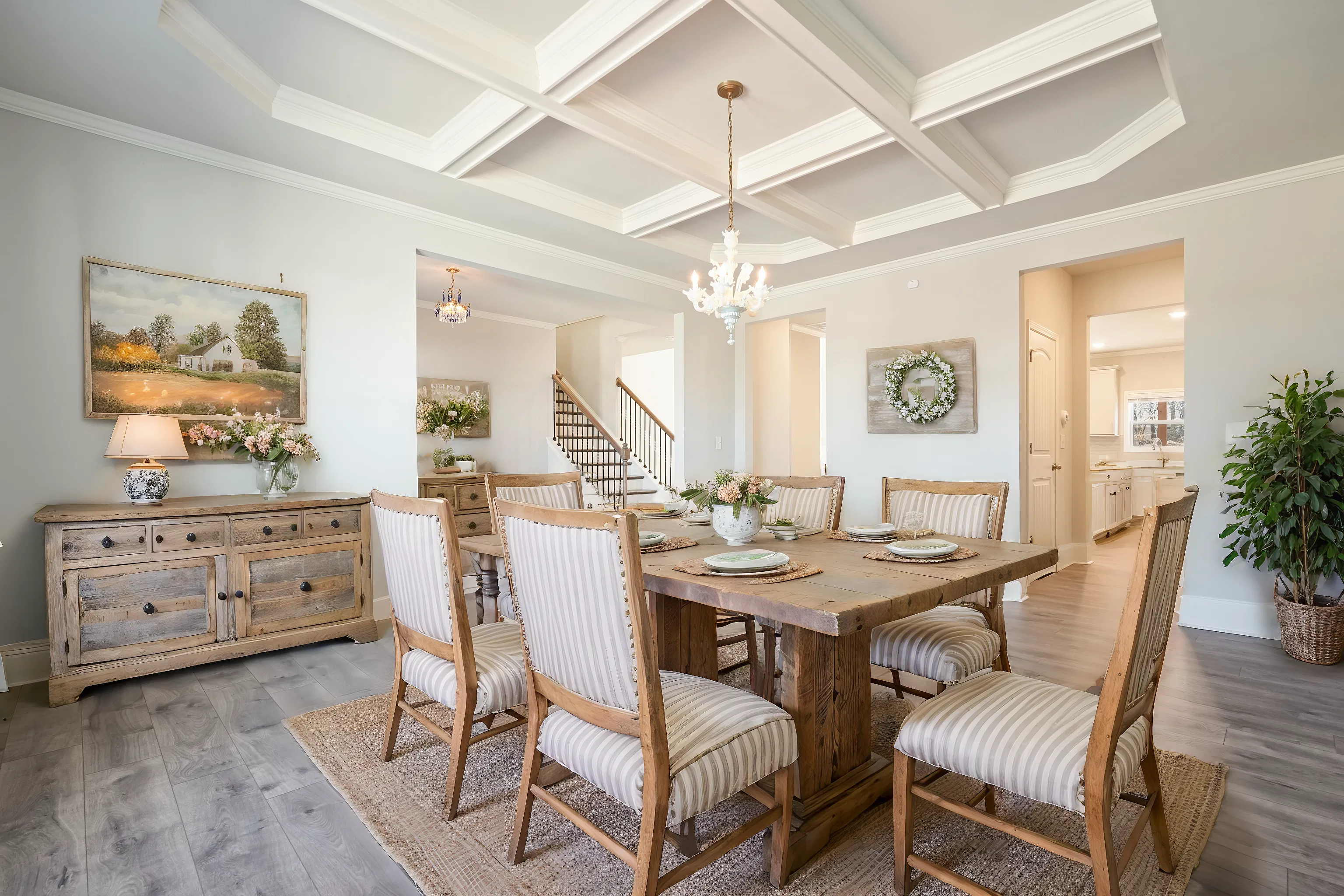 A vibrant view of a traditional dining area in an Acworth home, showcasing large windows and a warm, inviting farmhouse table, perfect for family gatherings.