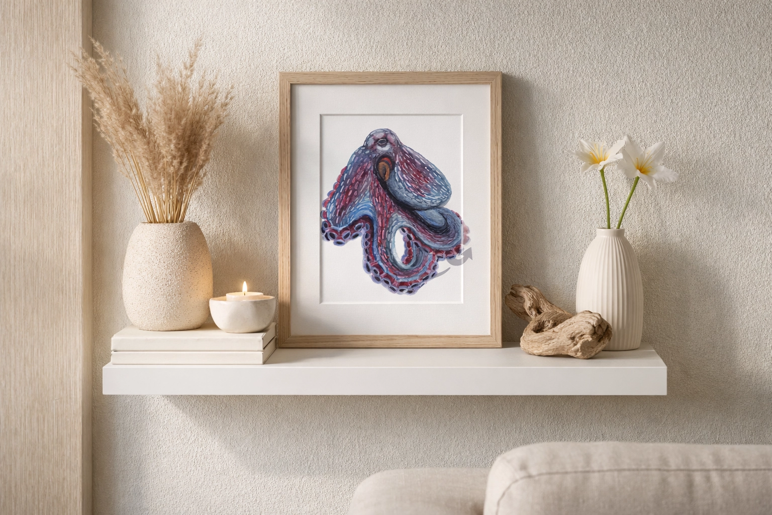 Vibrant octopus print mockup in a framed shelf vignette