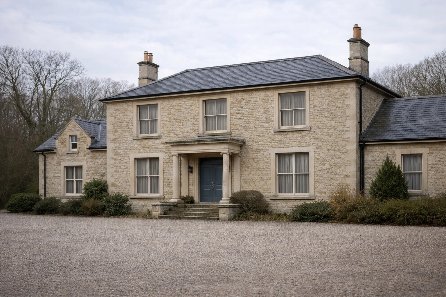 Unoccupied second home in British countryside with closed curtains and empty driveway