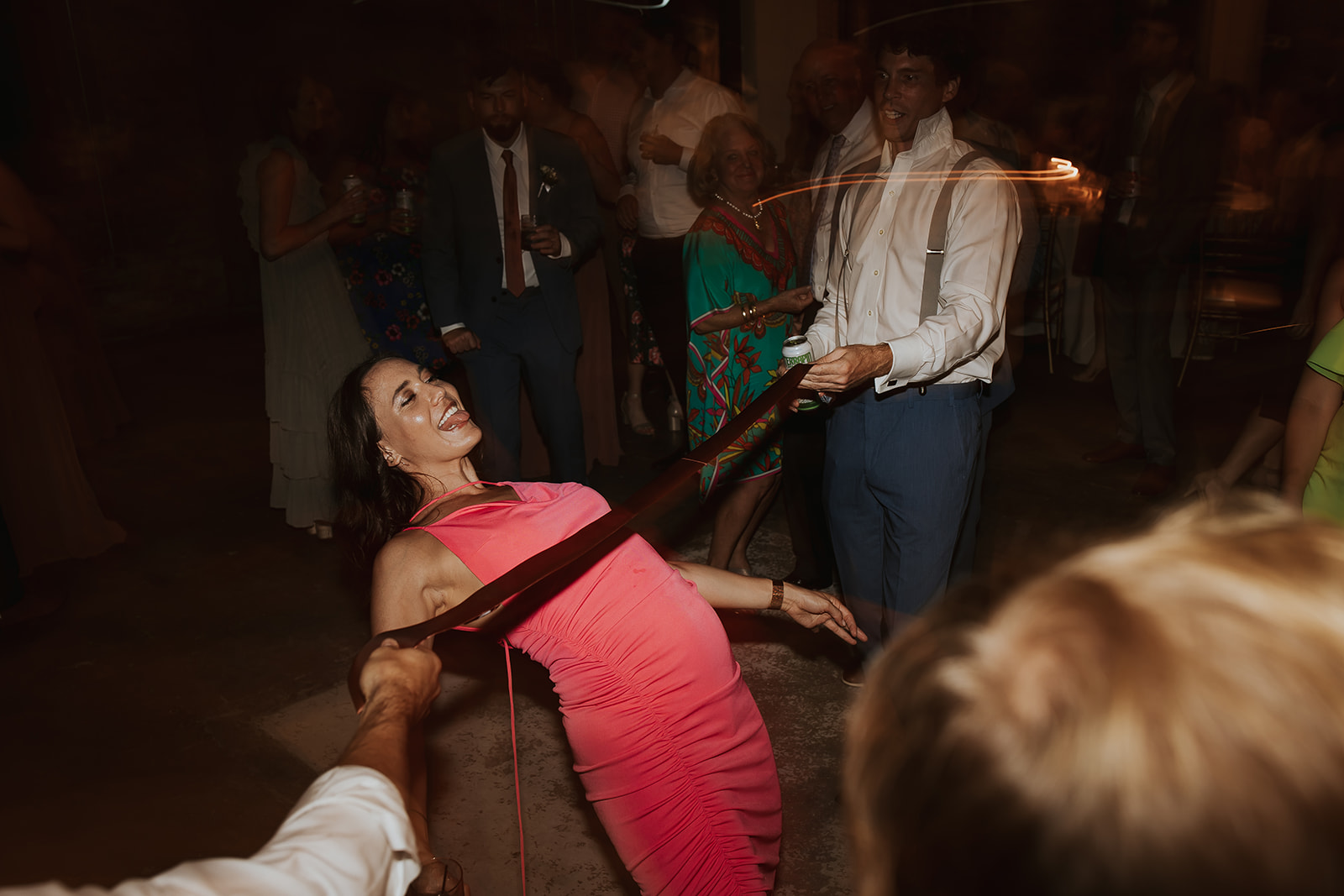 Lively Wedding Dance Floor Limbo Contest