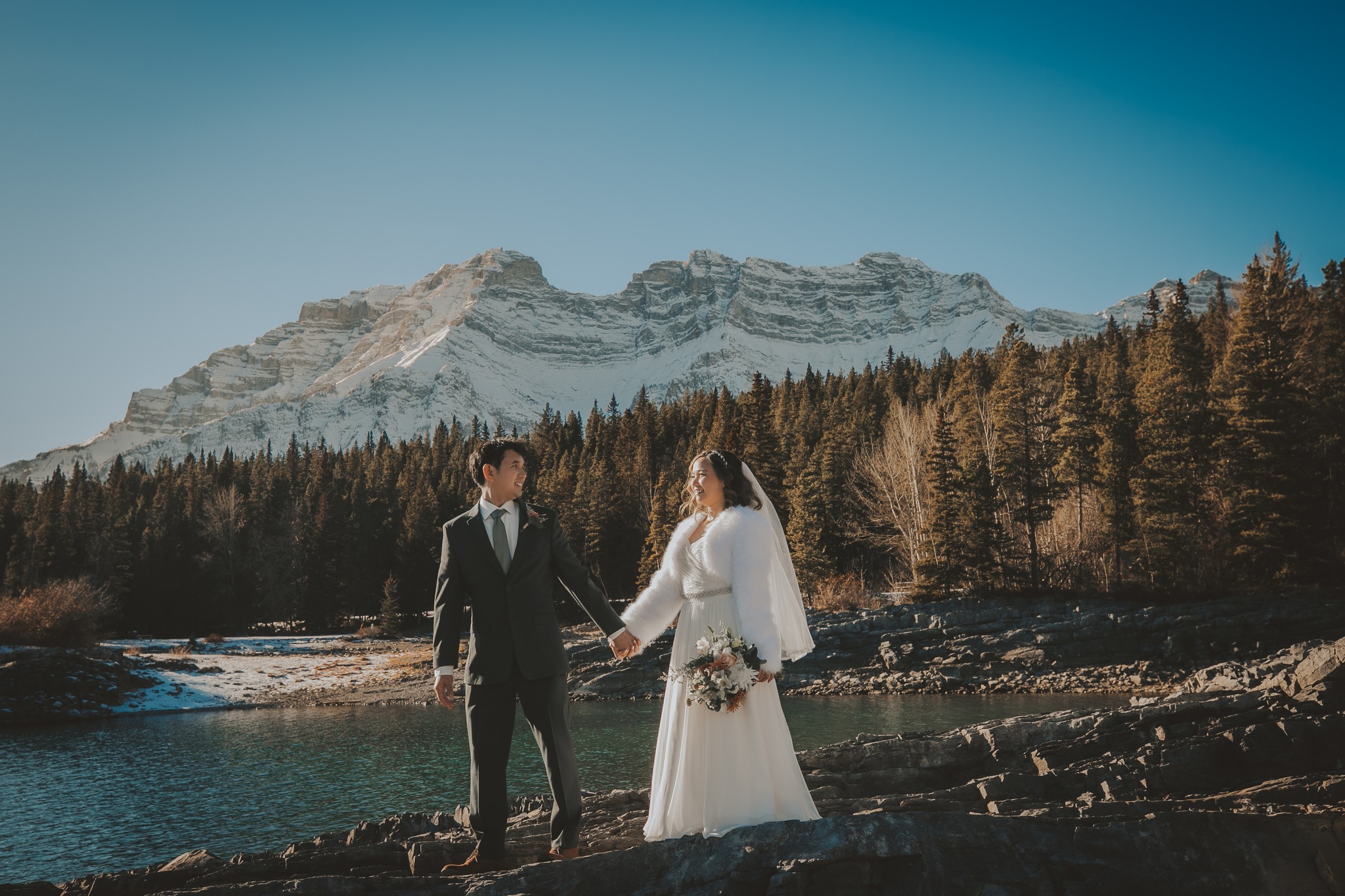 Newlywed Couple by Mountain Lake in Banff