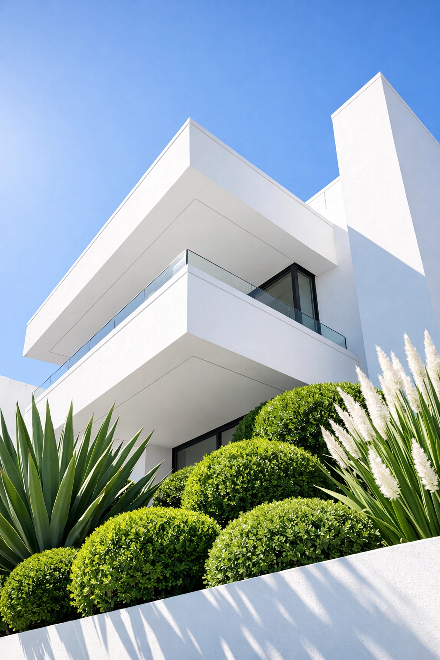 Modern white architecture and greenery representing scalable small business website growth in Innisfil.