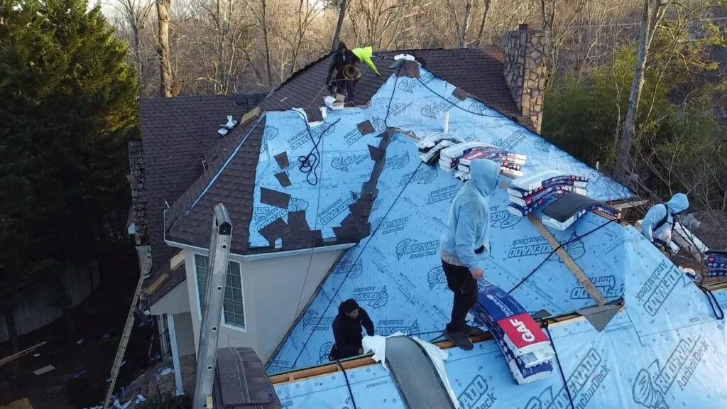 Roof Defender crew performing a residential roof replacement