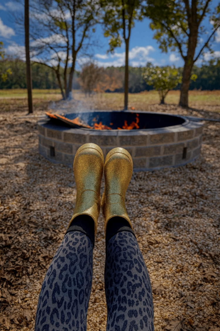 Client relaxing at fire pit in Georgia facility