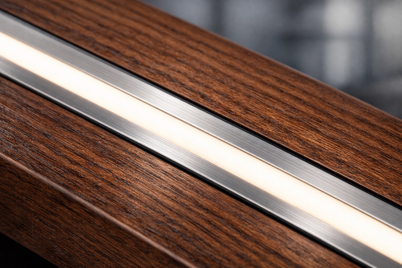 Professional linear LED lighting integrated into dark walnut custom cabinetry for a dot-free glow.