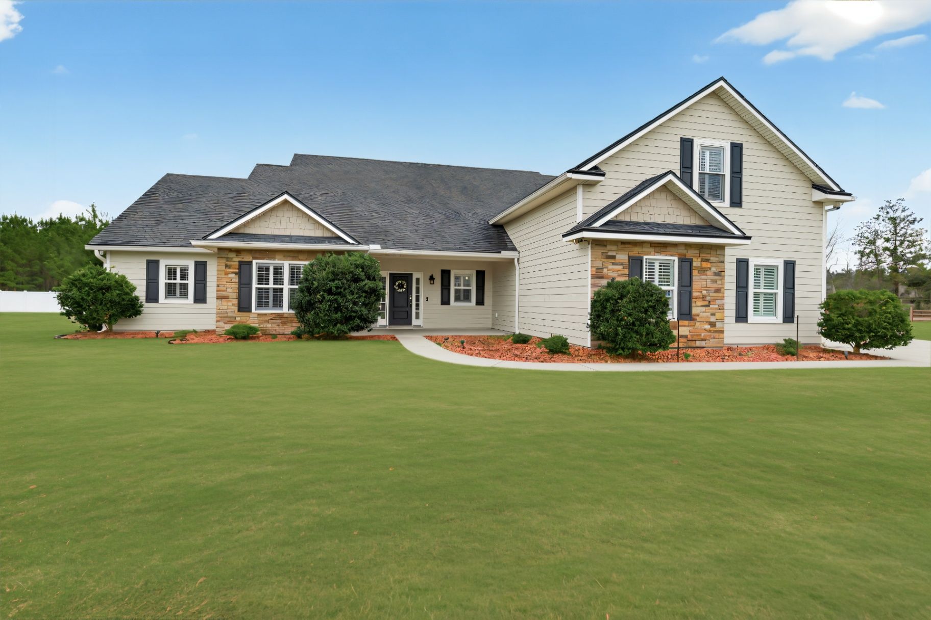 After grass enhancement at 37575 Kings Ferry showing lush green lawn