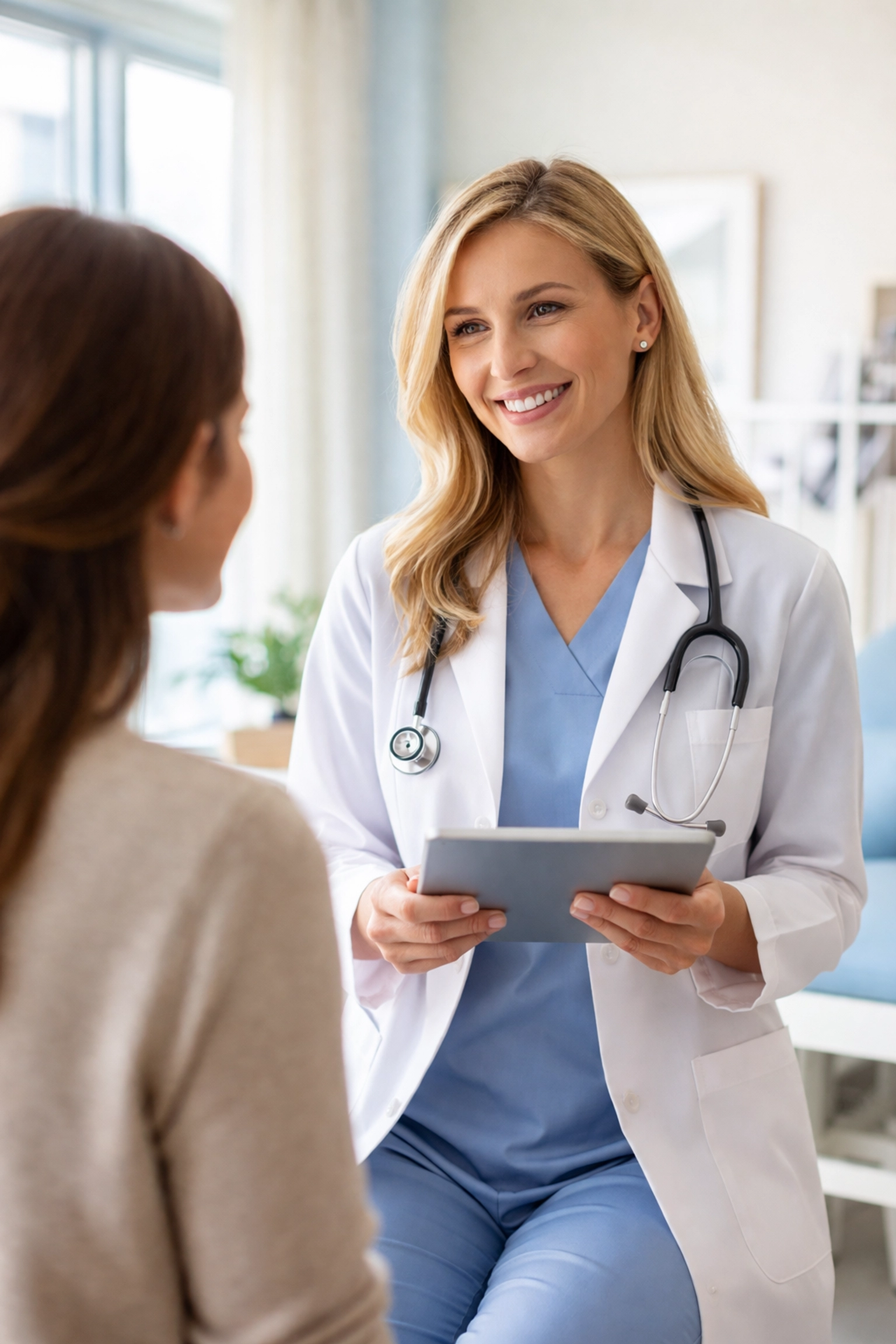 Friendly healthcare provider discussing personalized HRT treatment options in a bright medical office