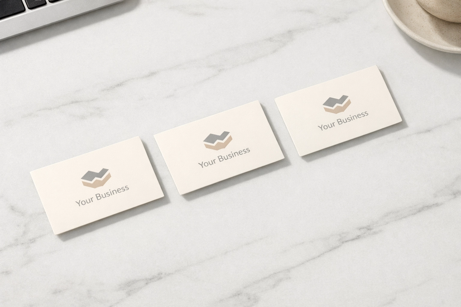 Identical business cards demonstrating consistent NAP information for local SEO