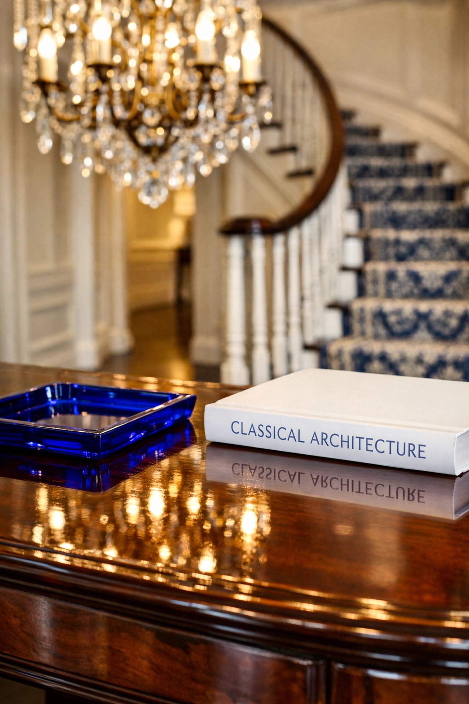 Detail of a luxury house cleaning in Brookline for a grand entryway with polished mahogany surfaces.