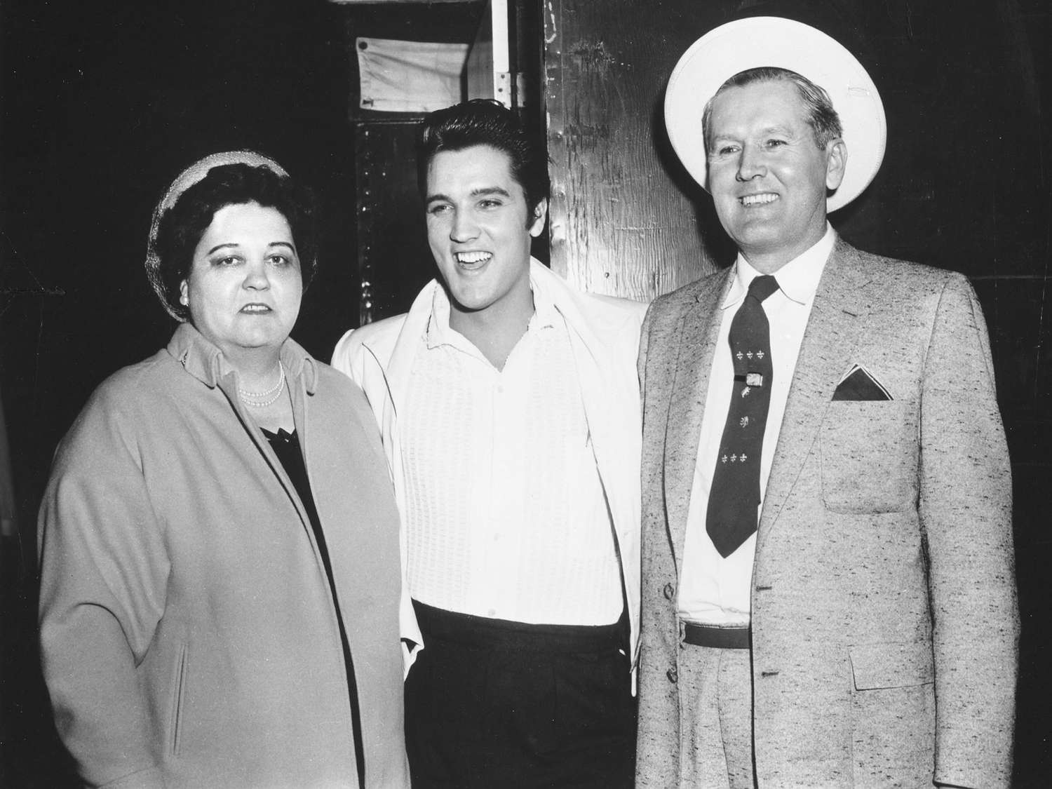 Elvis with Gladys and Vernon Presley (family photo)