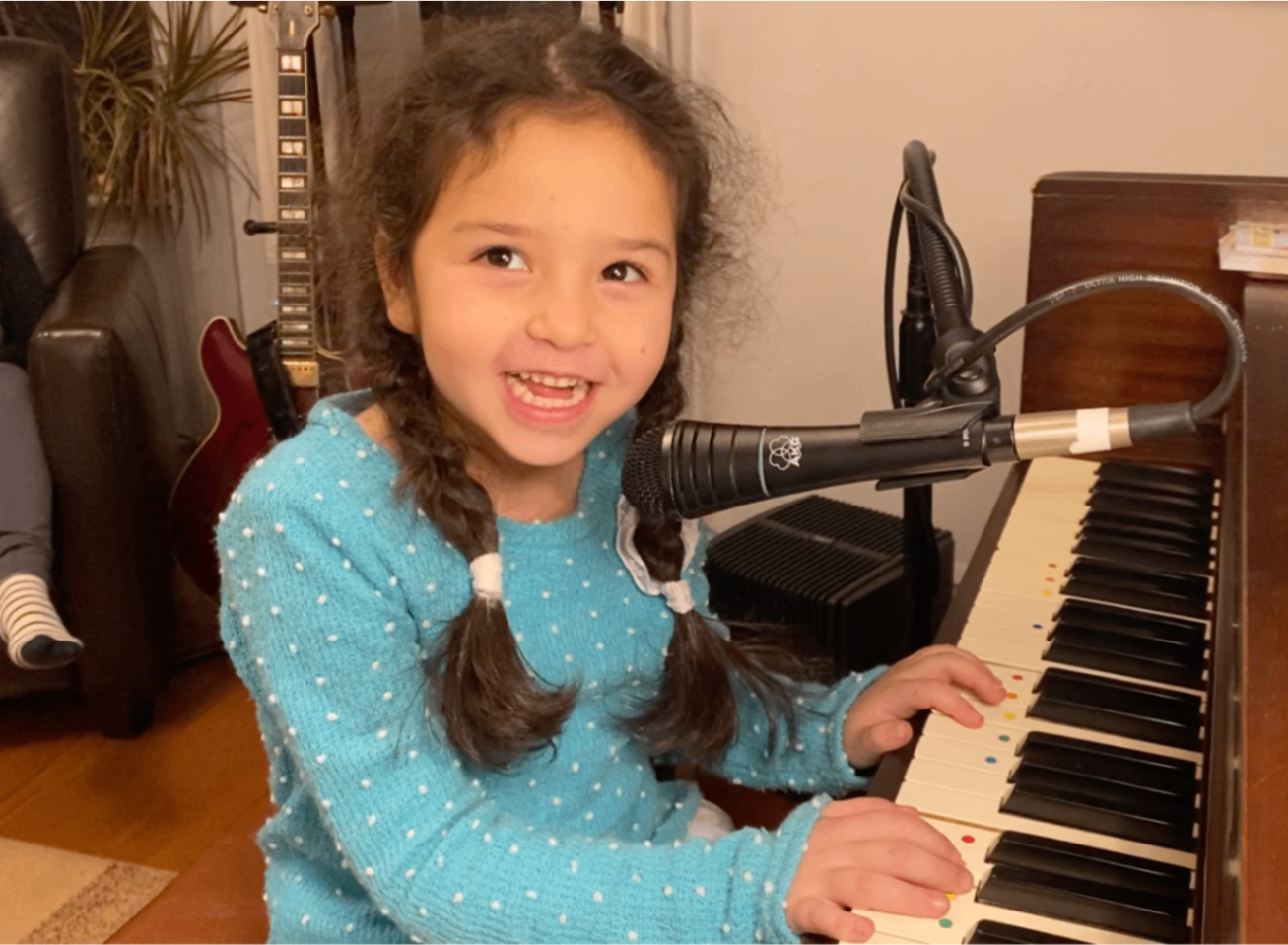 Child at Piano Using Musicolor Method Child at Piano Using Musicolor Method
