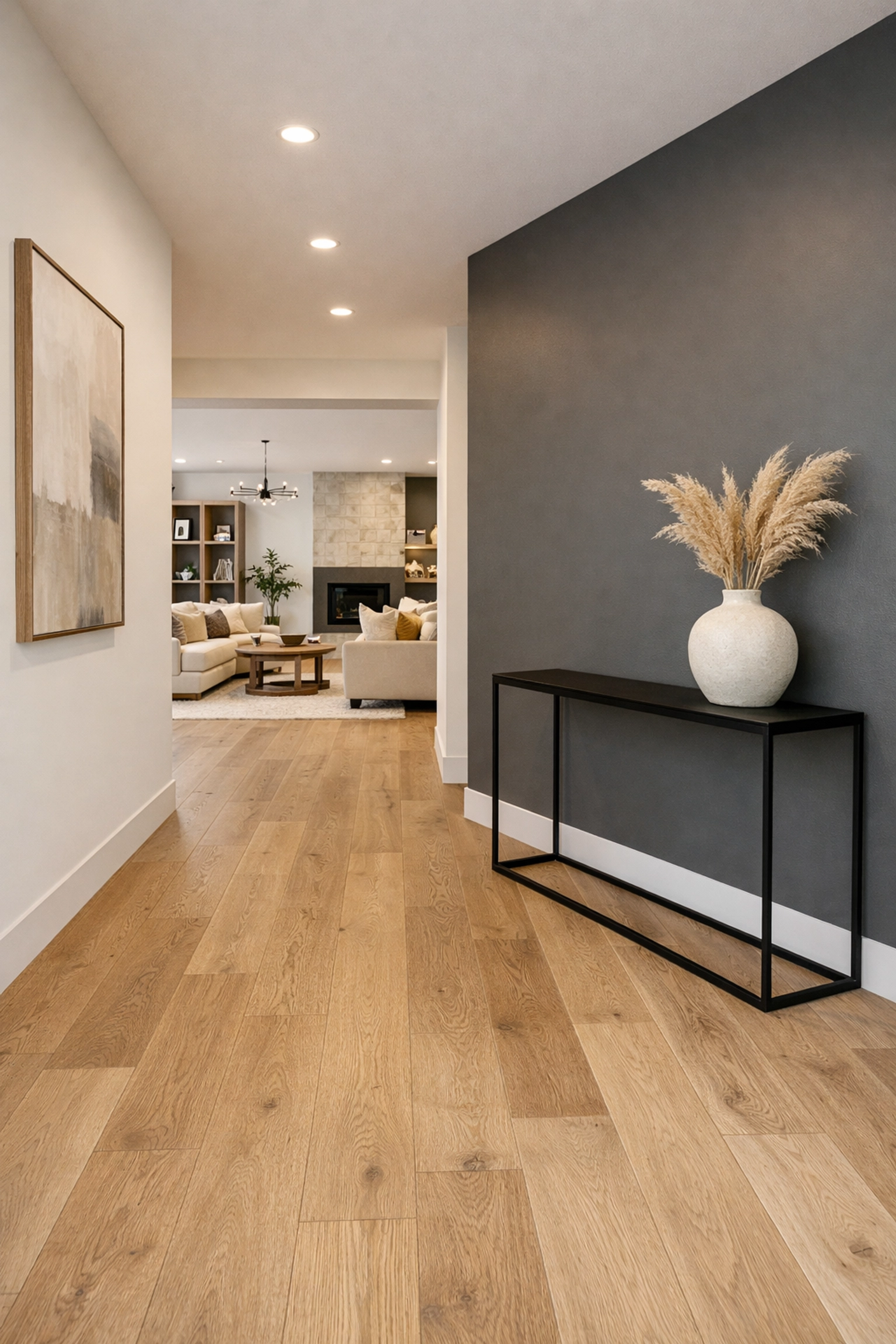 Cohesive flooring renovation in Orlando with light oak floors and modern painted walls.