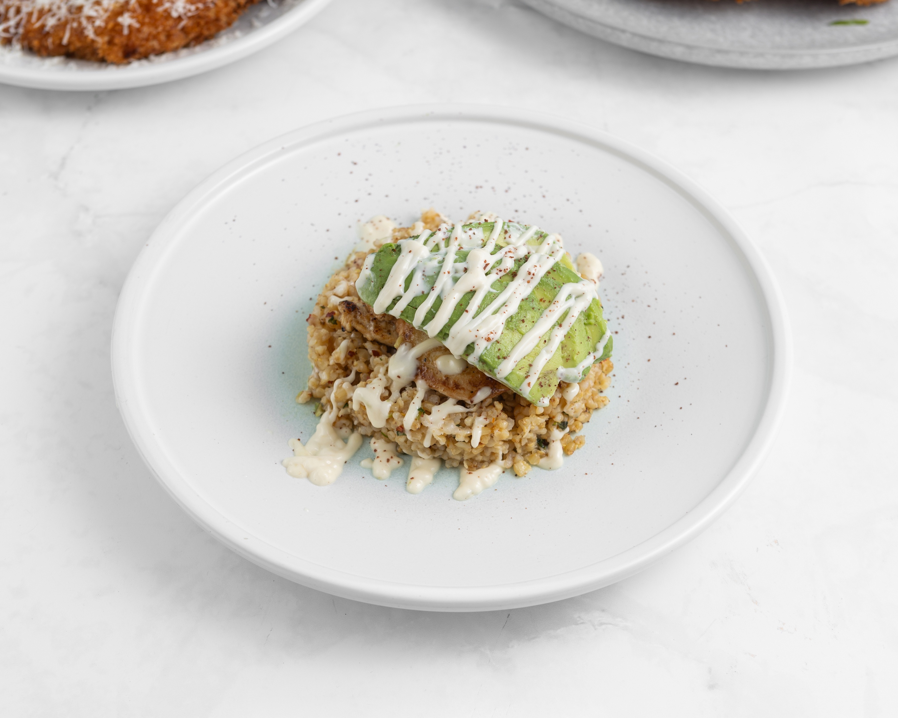 Seasoned Brown Rice with Avocado and Creamy Sauce