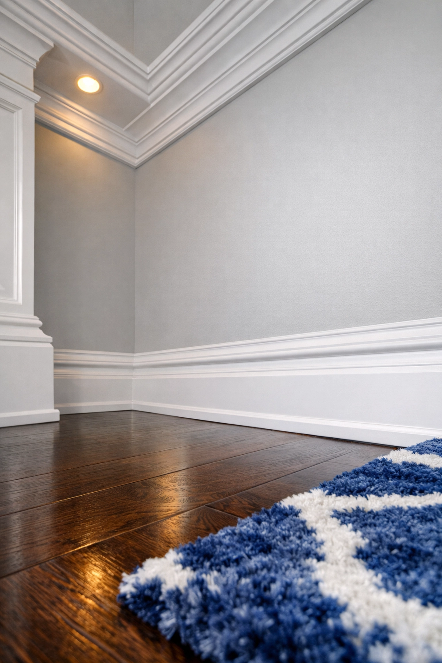 Spotless white baseboards and hardwood floors following a professional deep cleaning Winchester MA service.