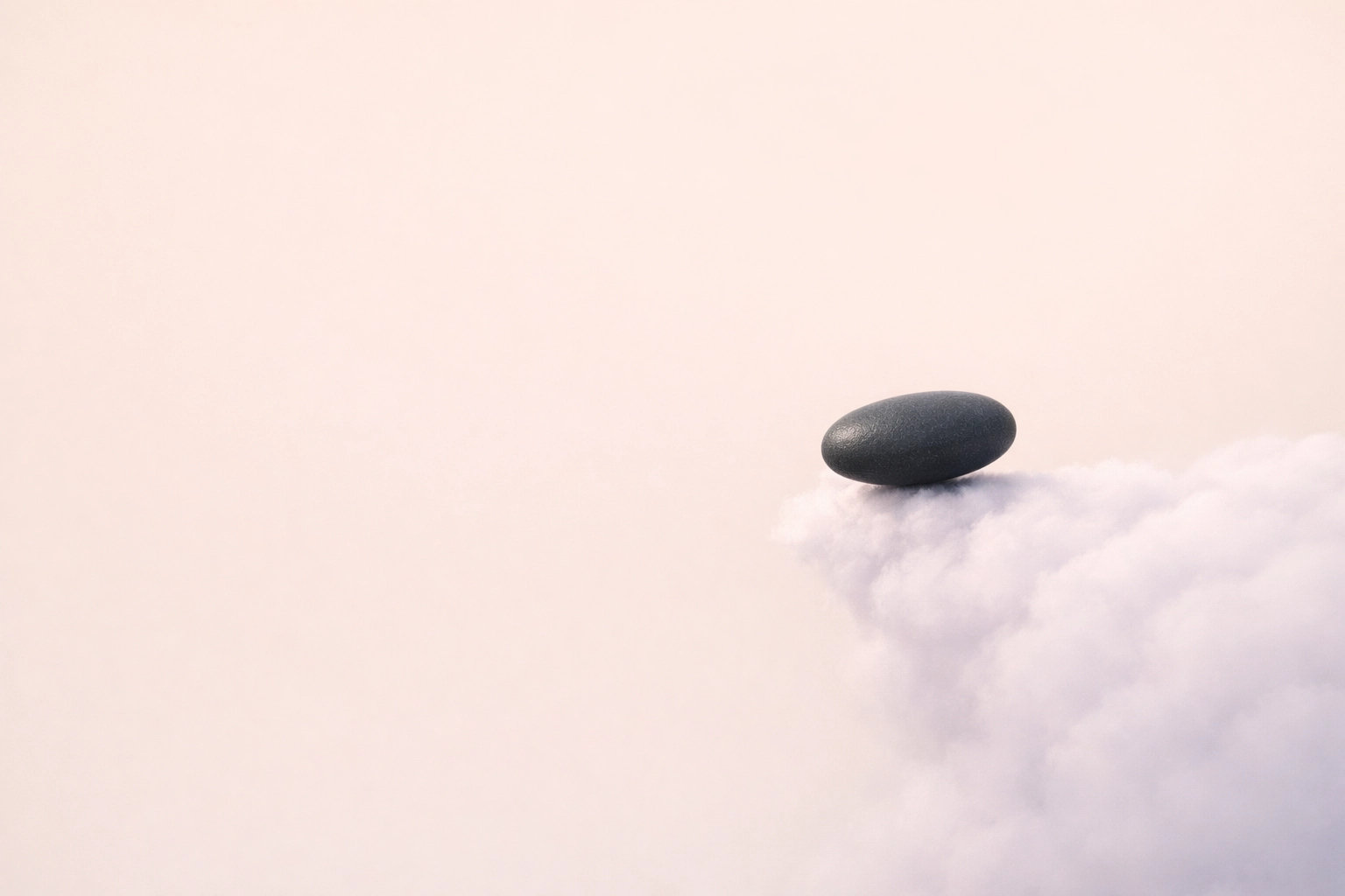 A balanced stone on a soft cloud representing executive stillness and recovery from exhaustion.