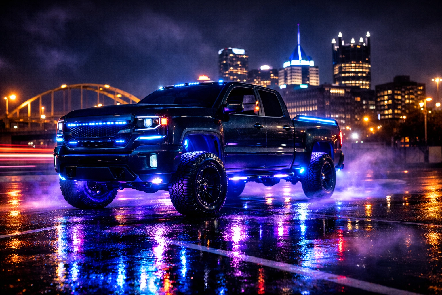 Custom truck with LED underglow and accent lighting illuminated at night in Pittsburgh