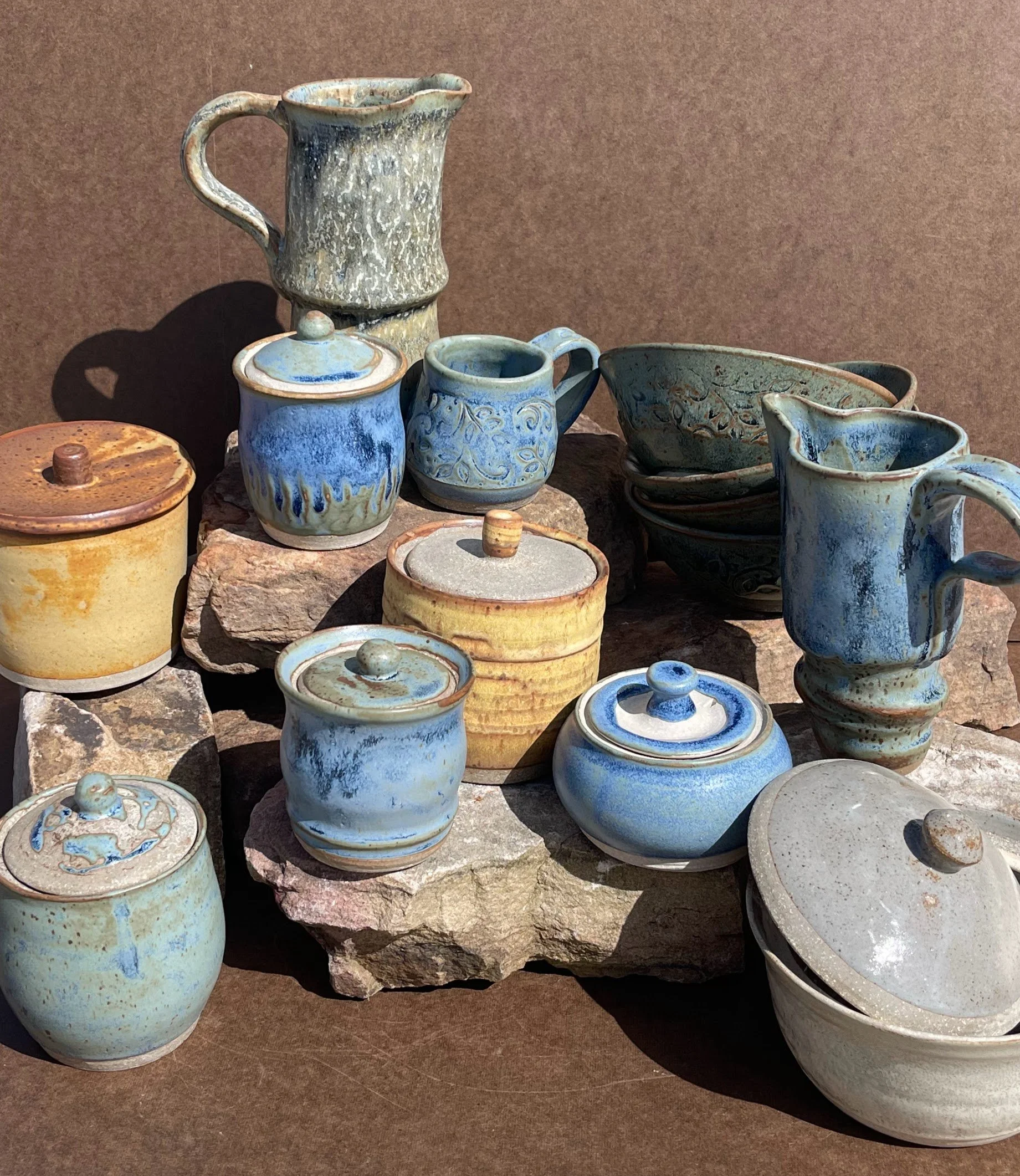 Handmade ceramic pitchers, bowls, and jars