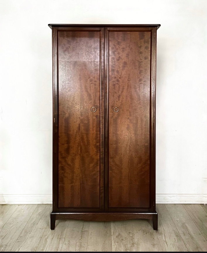 Before: a dark wood wardrobe with great bones, ready for a transformation.