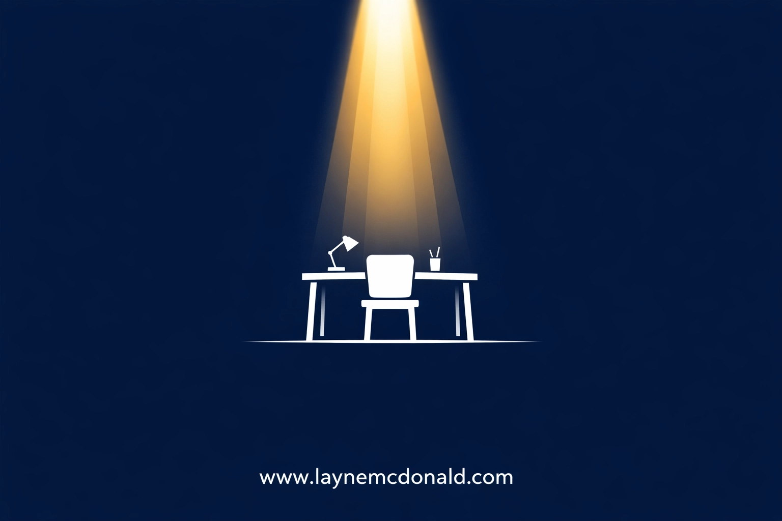 Minimalist desk illuminated by a golden beam of light symbolizing prayer-centered creativity for media professionals.