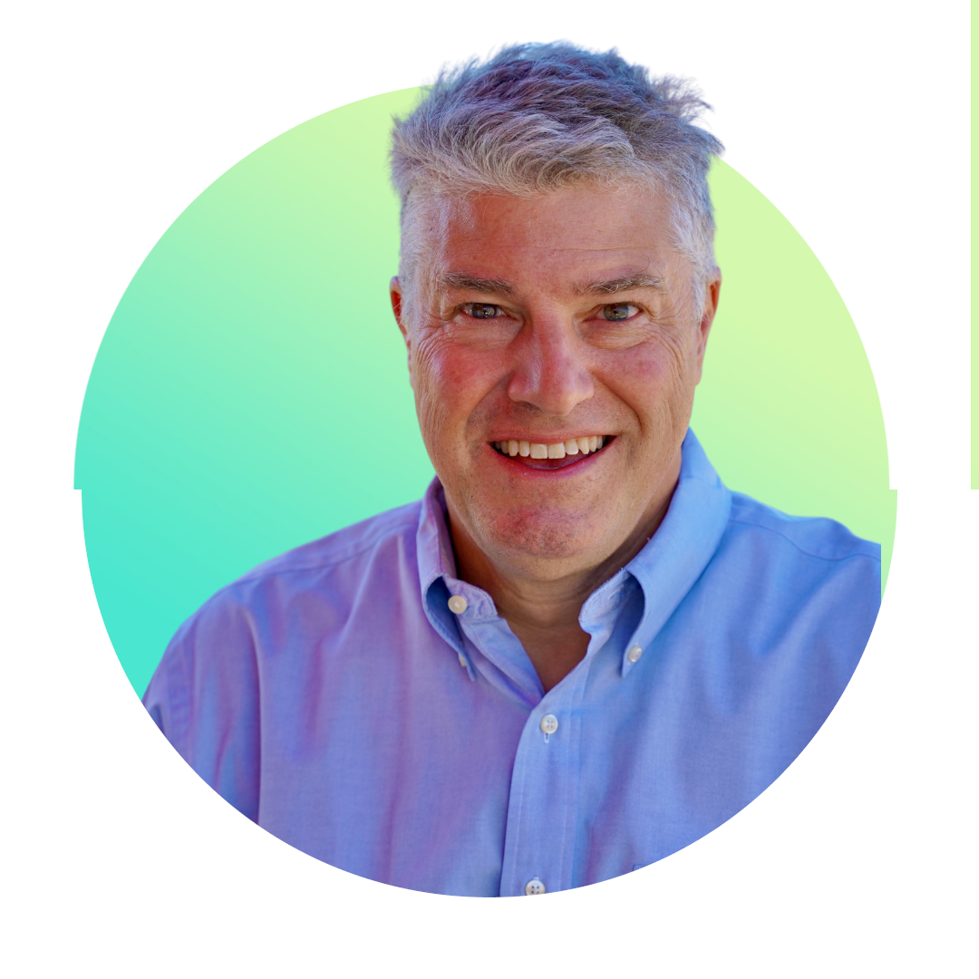 A man stands centered against a circular gradient background of blue and green. This professional portrait reflects the approachable, encouraging nature of The Leader Coach's leadership development and coaching philosophy.