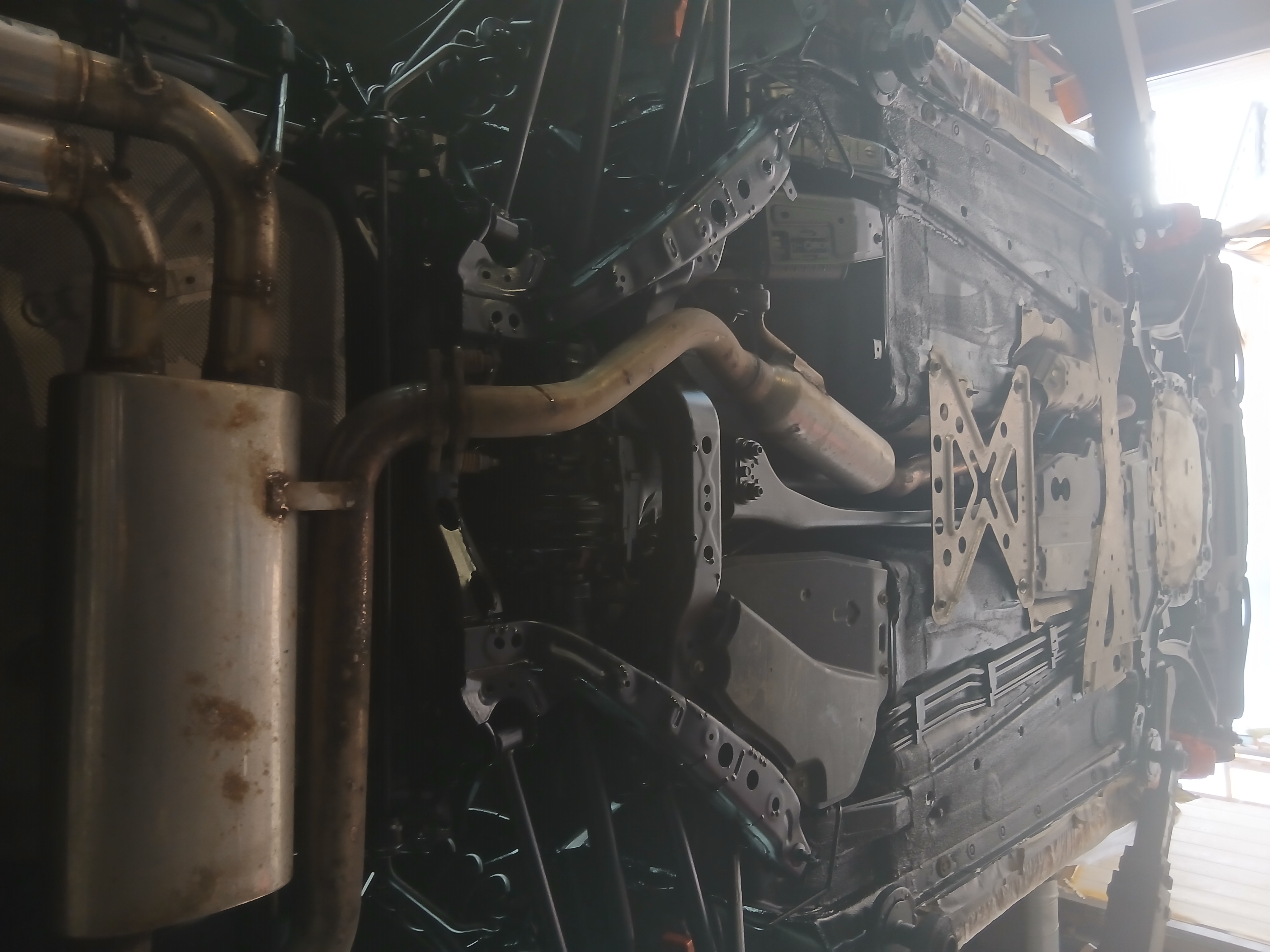 vehicle-underbody-exhaust-rust-inspection.jpg
