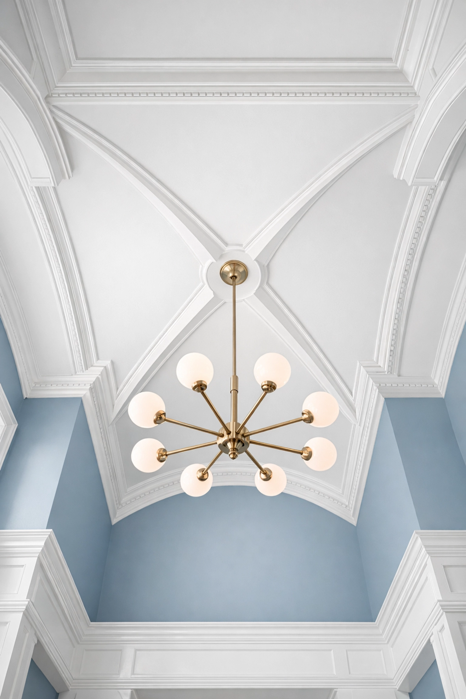 Clean crown molding and high ceilings showing the results of a top-down post construction cleaning Walpole.