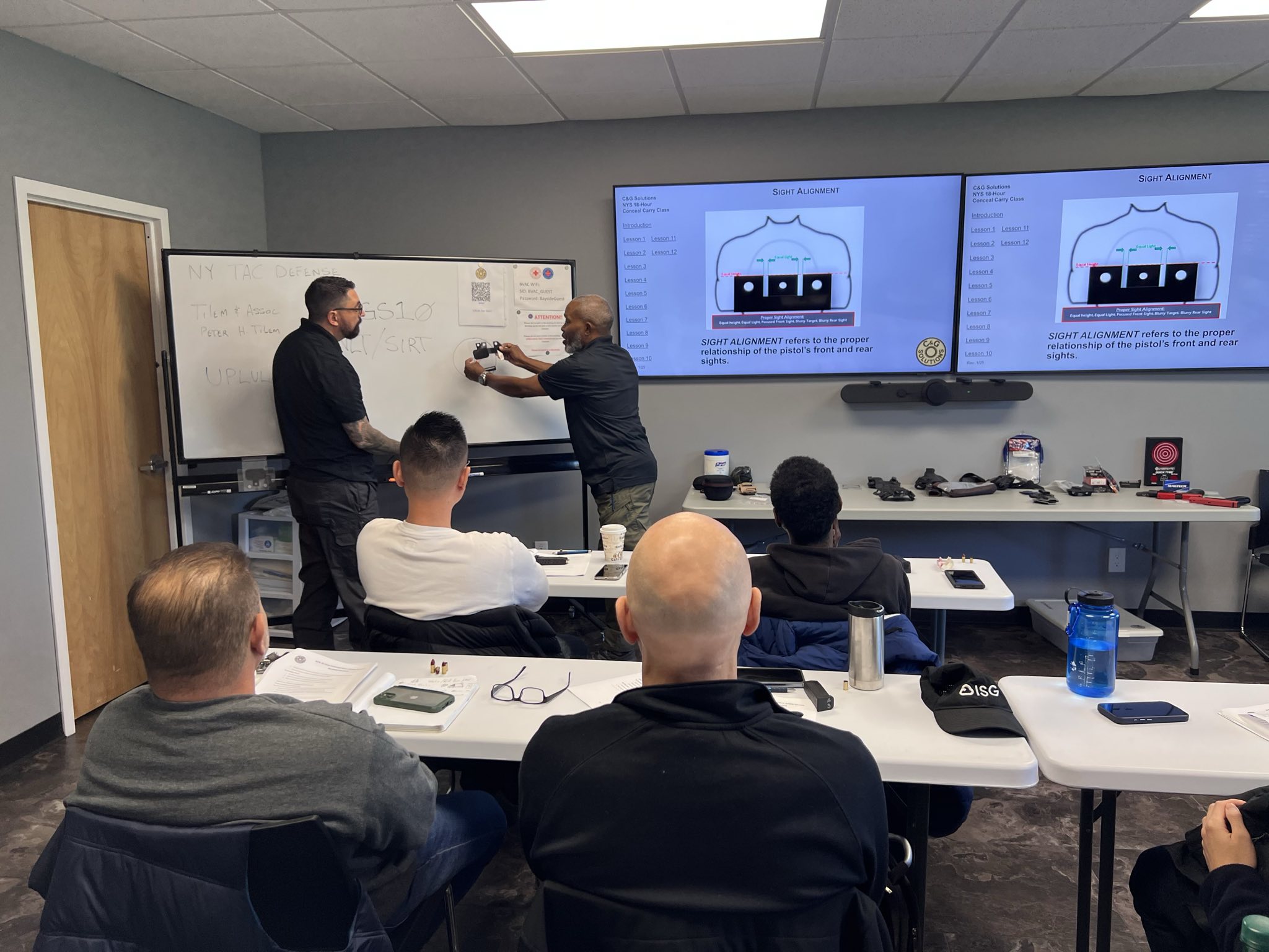 Instructor demonstrating proper technique