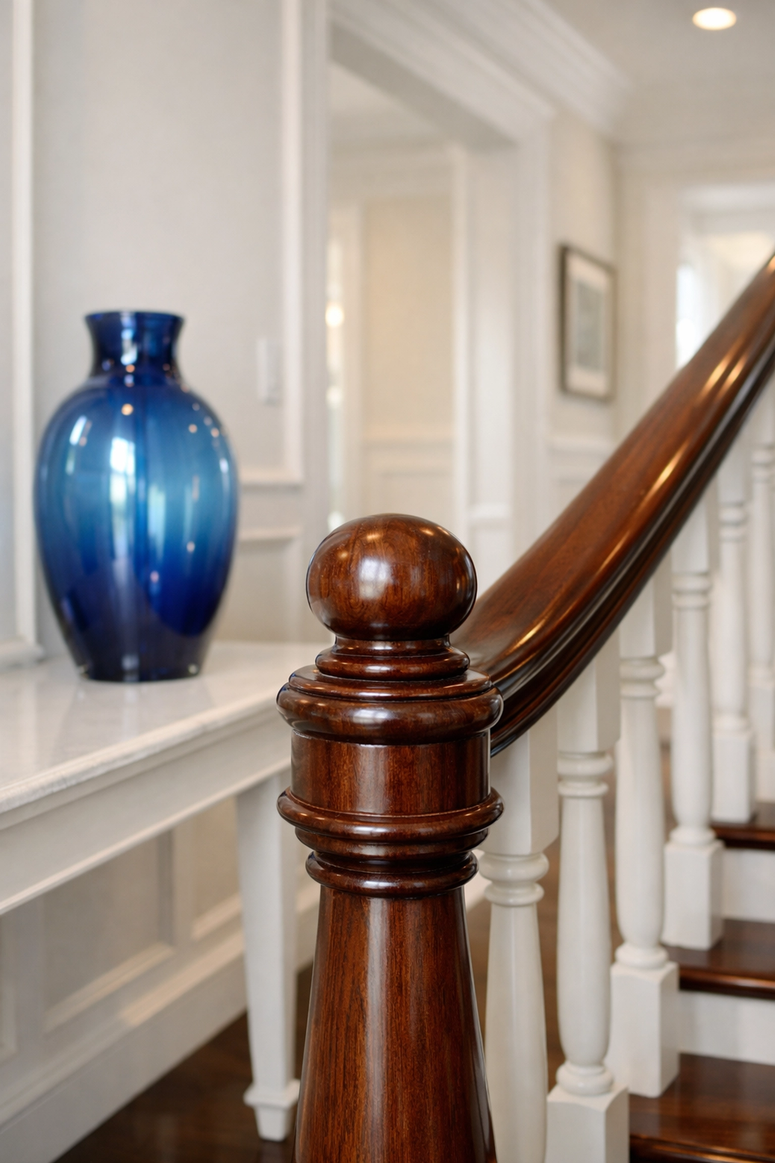 Dust-free wooden staircase banister in a home after professional deep cleaning Worcester.