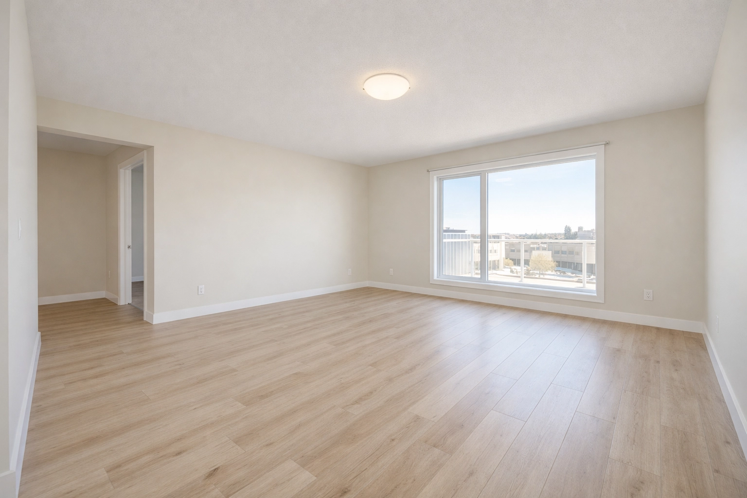 Clean Saskatoon rental with vinyl plank flooring to reduce vacancy and turnover costs.