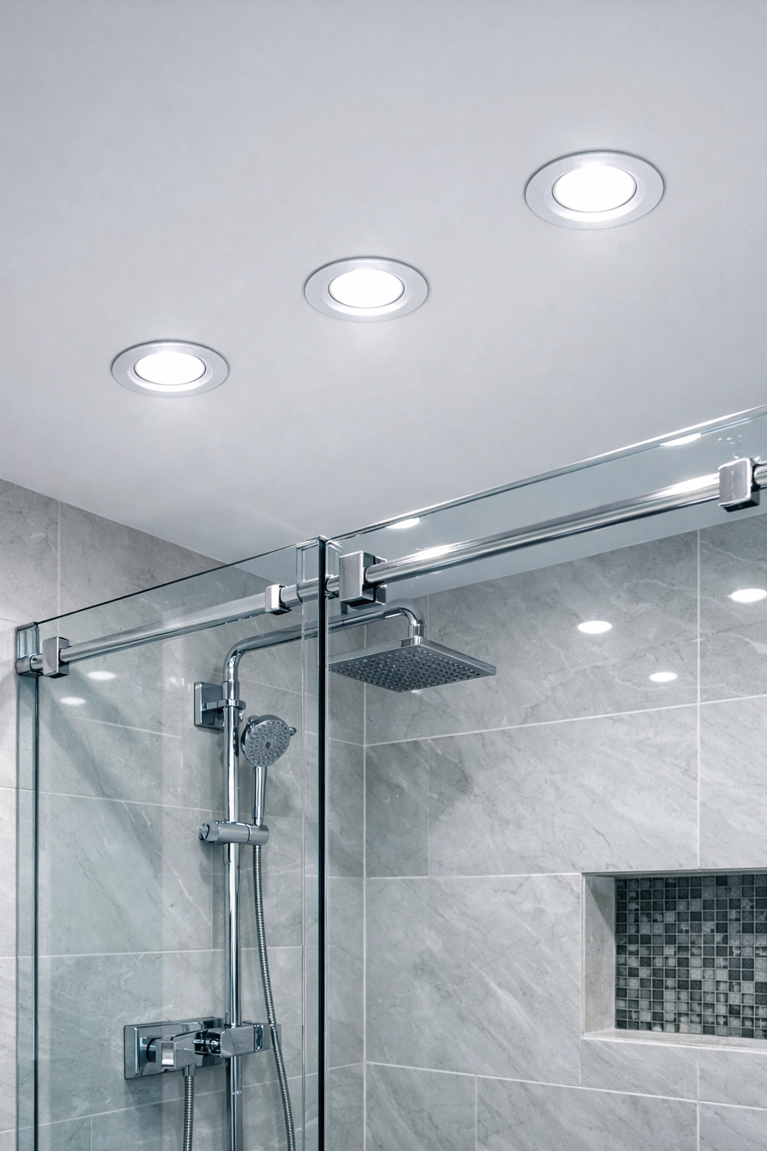 Safe IP-rated bathroom spotlights installed in a modern home by a qualified electrician in Dorset.
