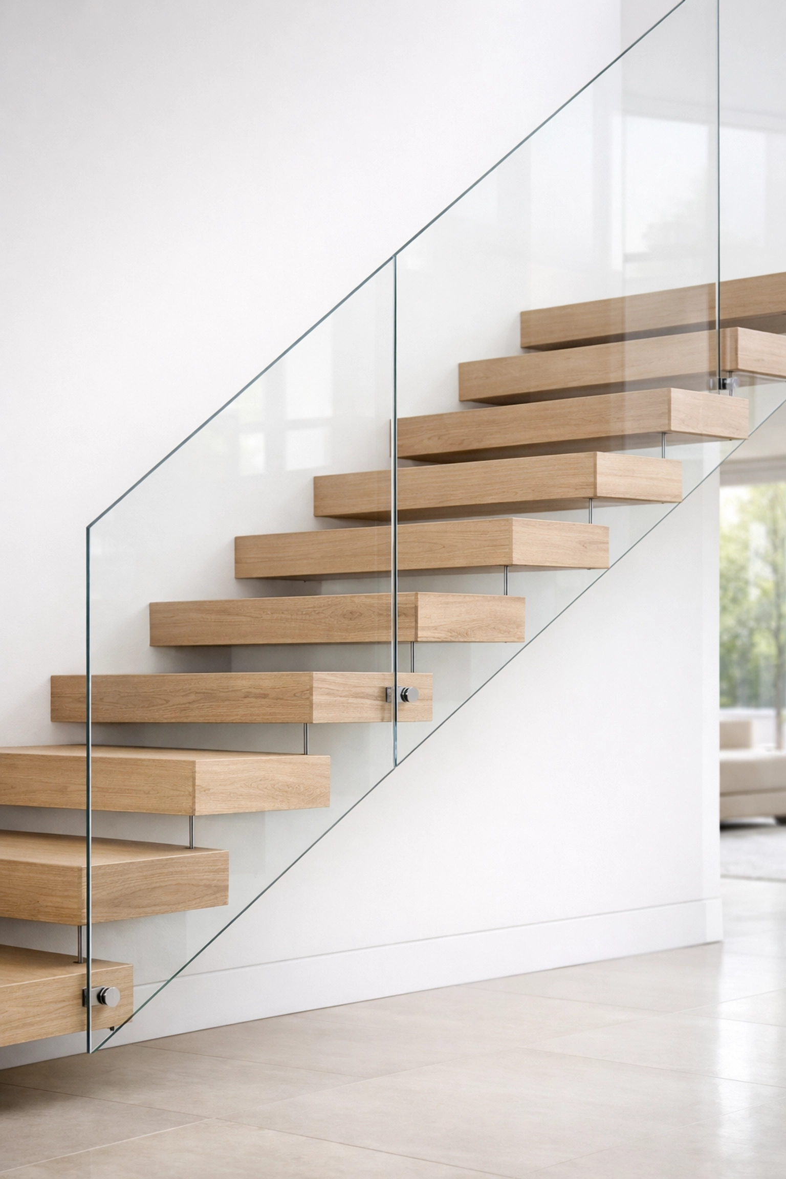 Minimalist floating staircase in a Surrey build, demonstrating precise architectural and structural engineering coordination.
