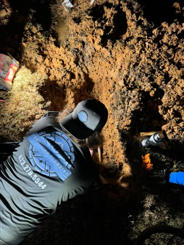 Provision Plumbing technician conducts an emergency night excavation repair