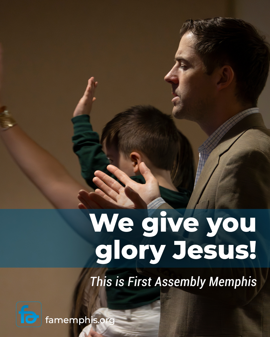 First Assembly Memphis Worship Service A man and child worship together with eyes closed and hands raised, reflecting heartfelt praise during a church service.