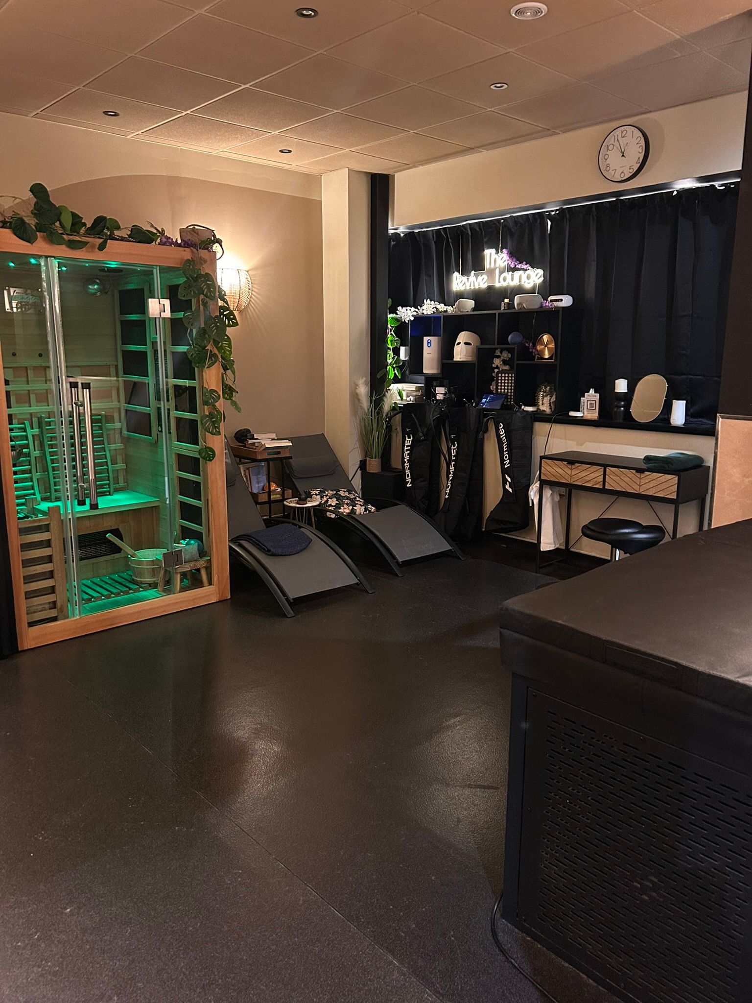 Deep tissue recovery session in an infrared sauna at The Wellness Lounge in Cardiff.