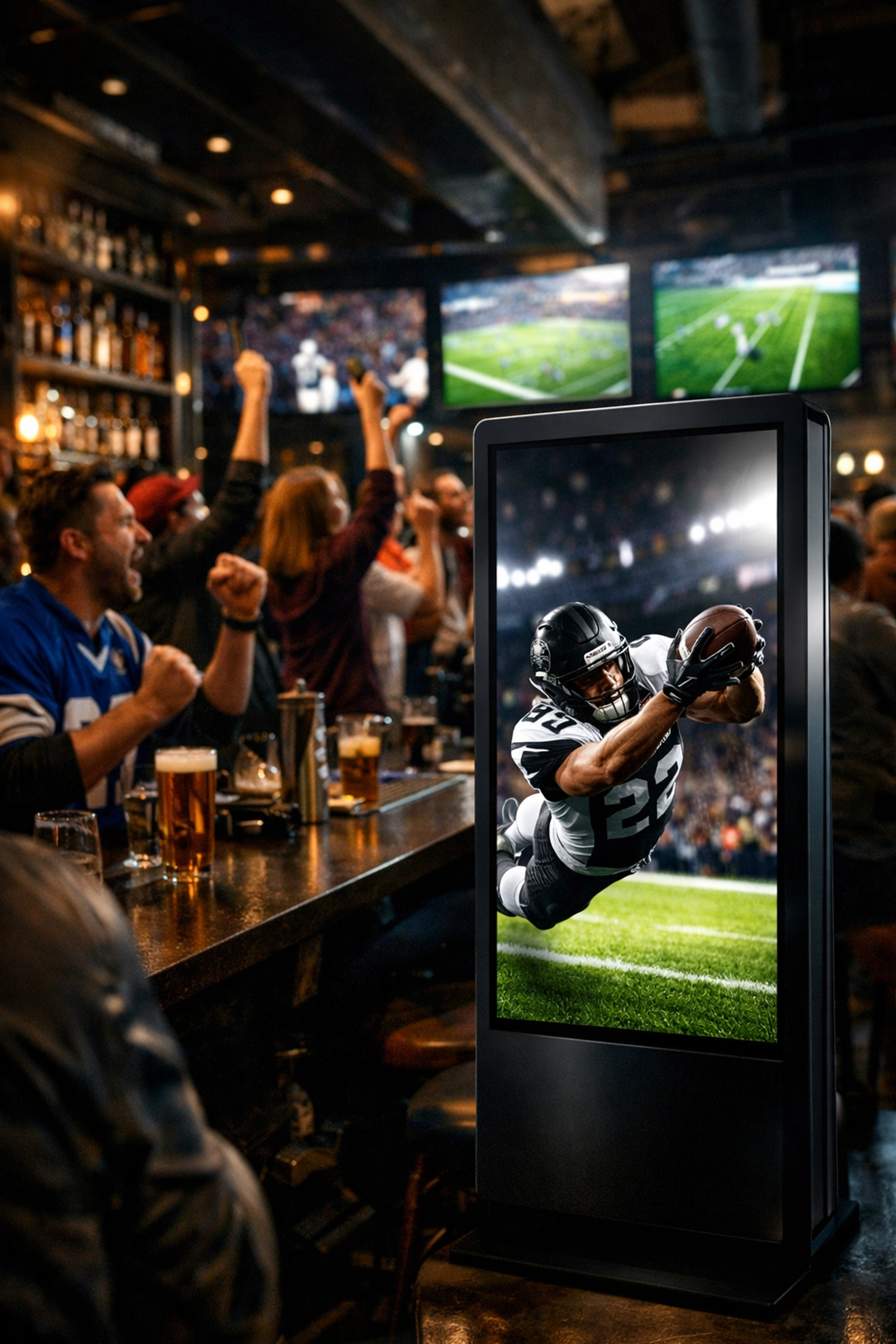 Sports bar fans watching a game while digital NIL advertisements are shown on a high-impact vertical kiosk screen.
