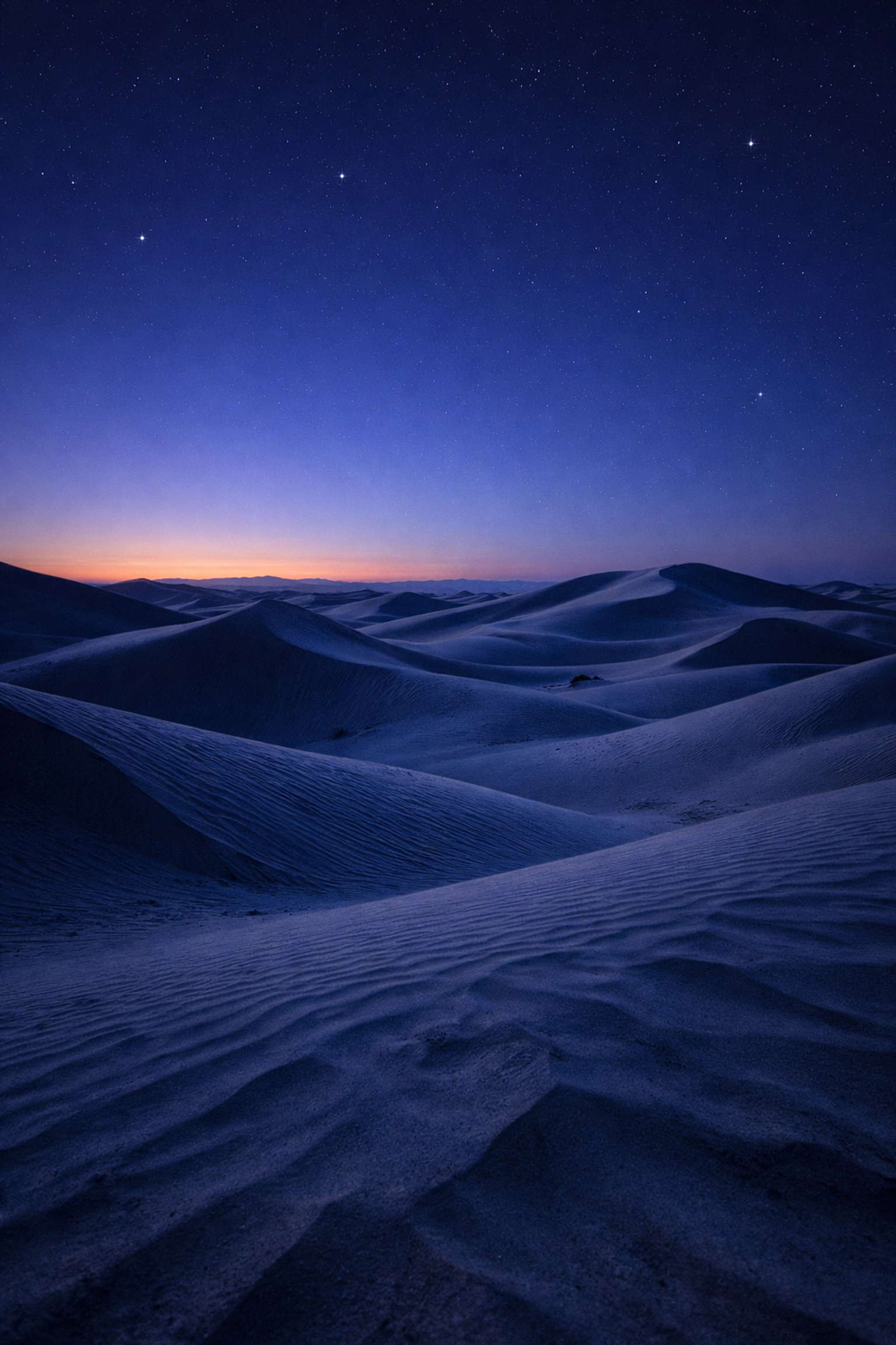 Blue hour desert sand dunes under twilight sky, landscape photography lighting for beginners