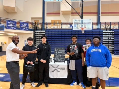 Hamilton HS Career Fair - Booth Wide Shot X Quest Life booth display and group shot at Hamilton High School.