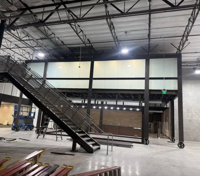 Switchable smart film transitioning from clear to frosted in a high-rise executive conference room, highlighting privacy and views