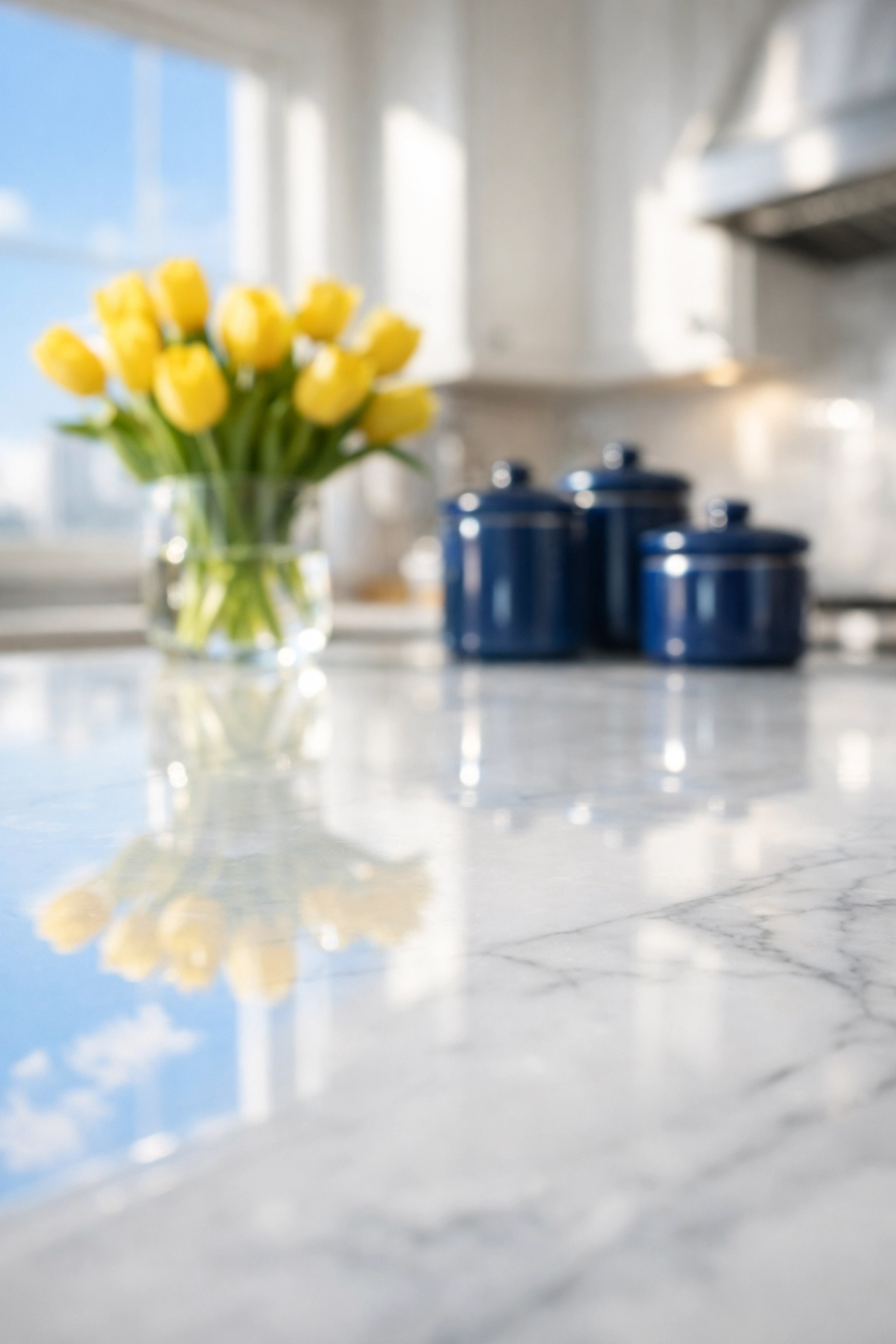 Streak-free white marble kitchen island showing the results of professional weekly house cleaning.