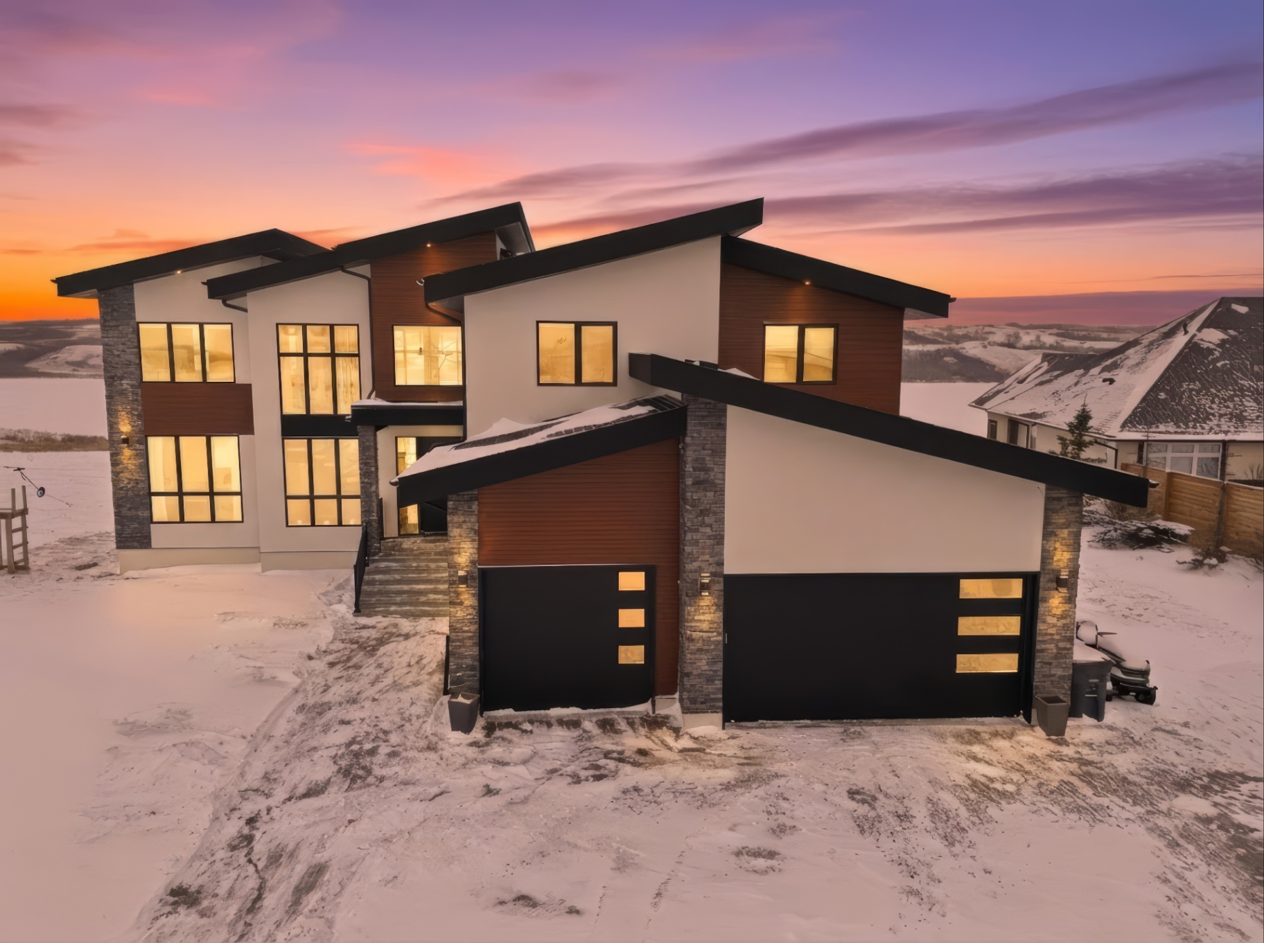 Aerial twilight photo of modern two-storey home