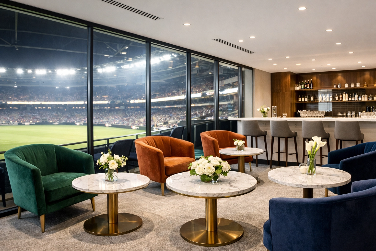 Luxury corporate hospitality suite with a stadium view for exclusive Super Bowl networking.
