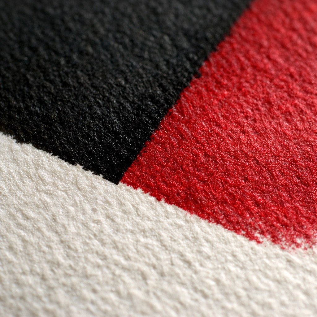 Close-up of high-quality pigment ink on archival paper showing the rich texture of museum quality prints.