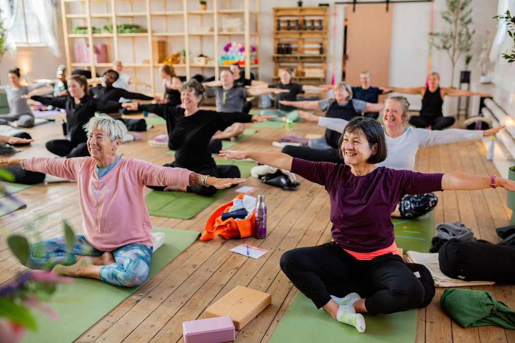 Group Yoga Class in Sunlit Studio
