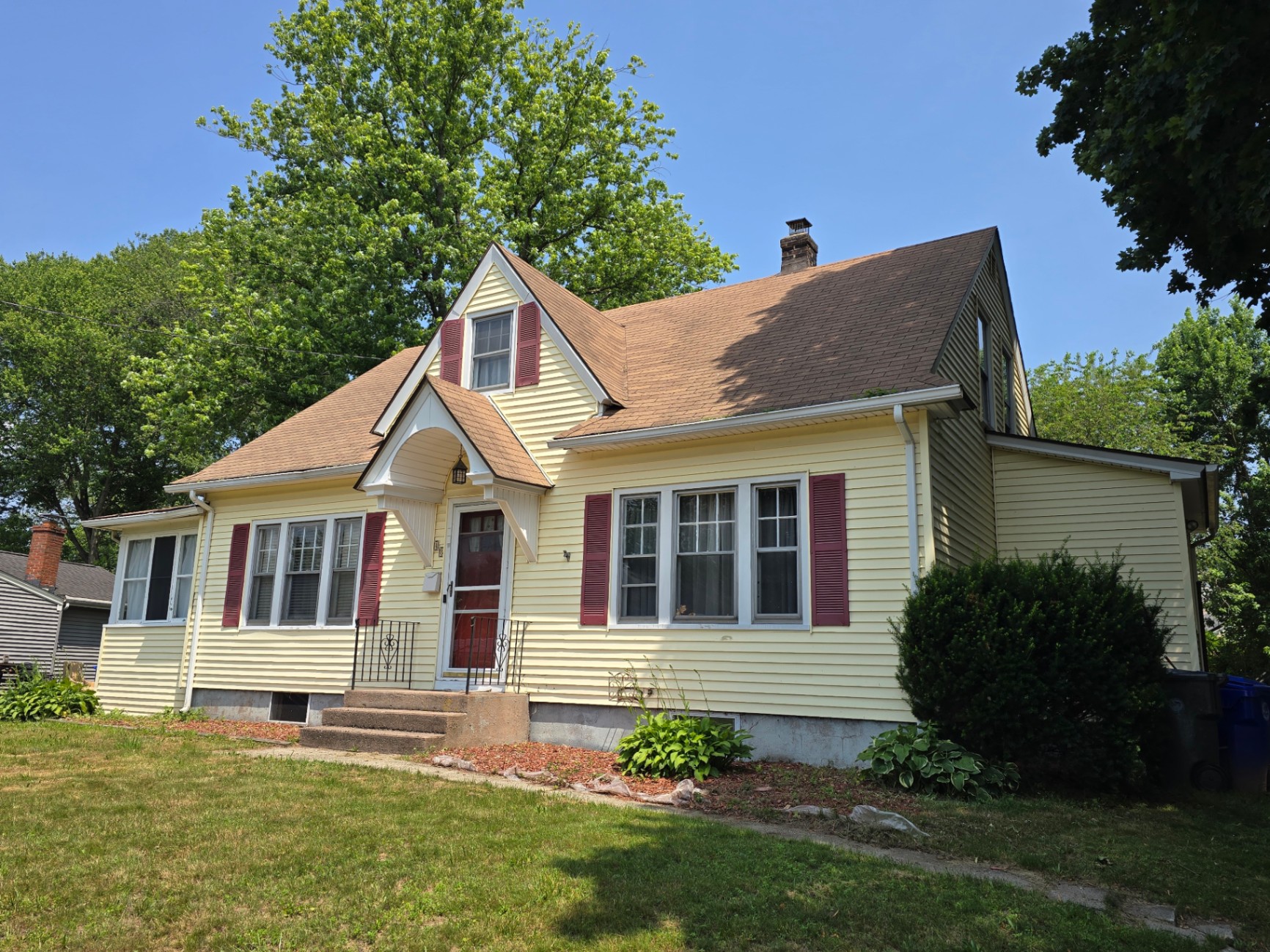 Charming yellow Cape-style home