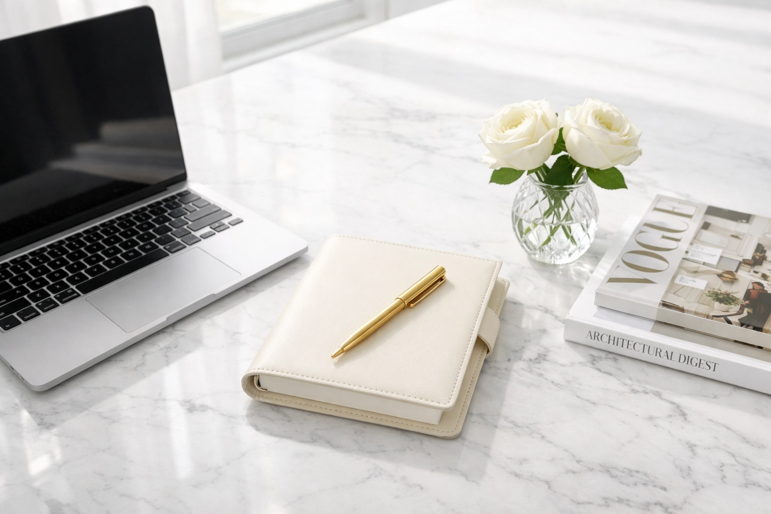 Professional creator workspace with marble desk and laptop, highlighting influencer marketing and content strategy.