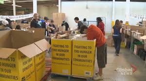 Volunteers Sorting Donations at Community Facility