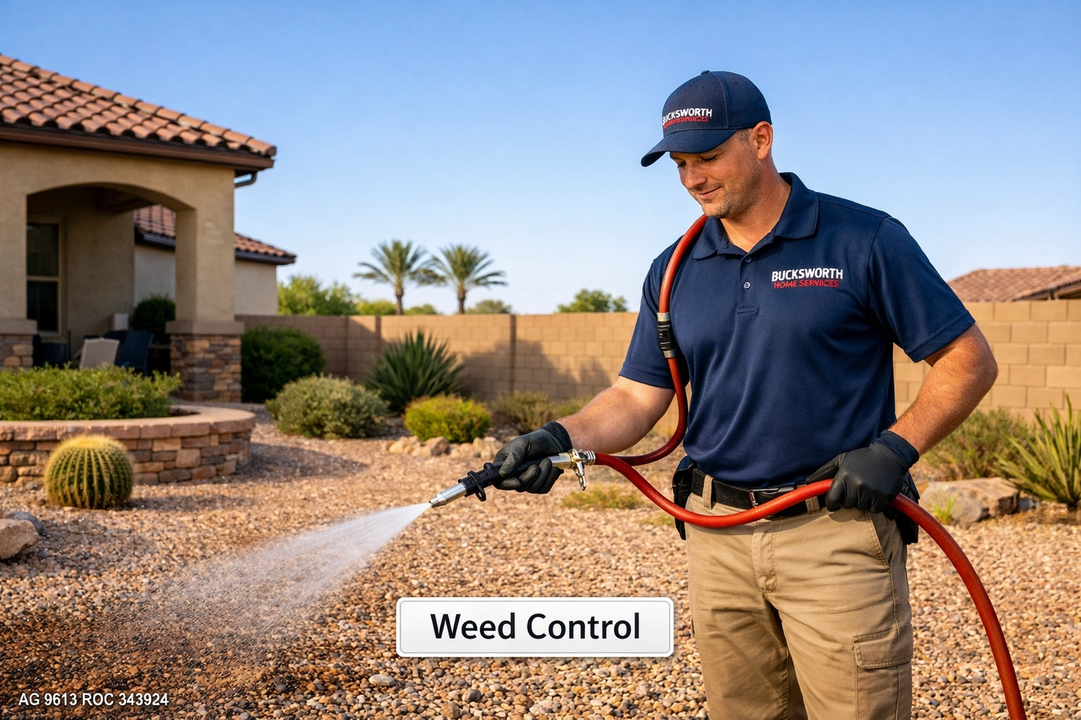 Bucksworth Home Services technician applying professional weed control spray in an Eastmark Mesa AZ 85209 yard.