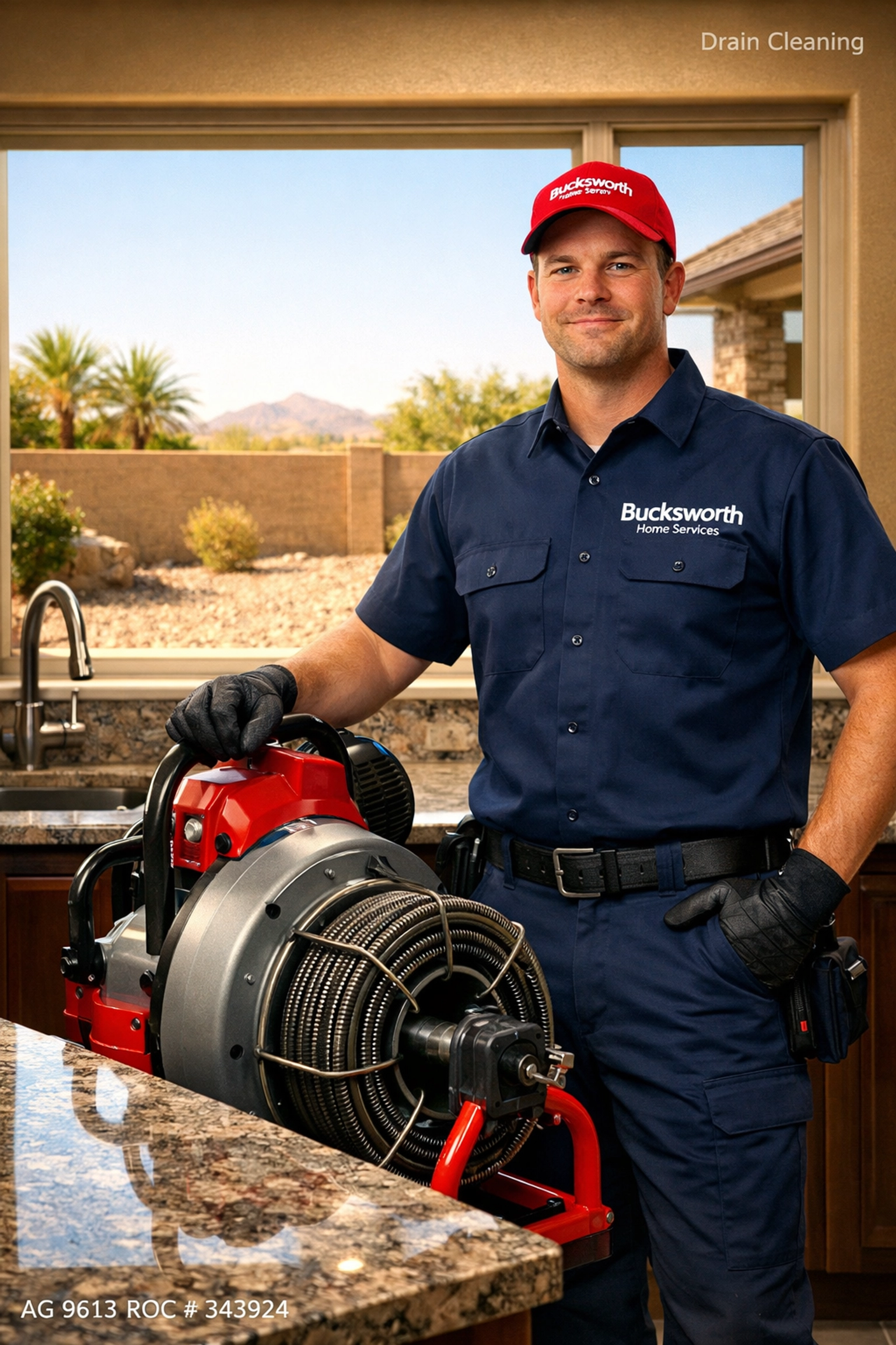 Professional Bucksworth Home Services technician with a drain cleaning machine in a modern Peoria home.