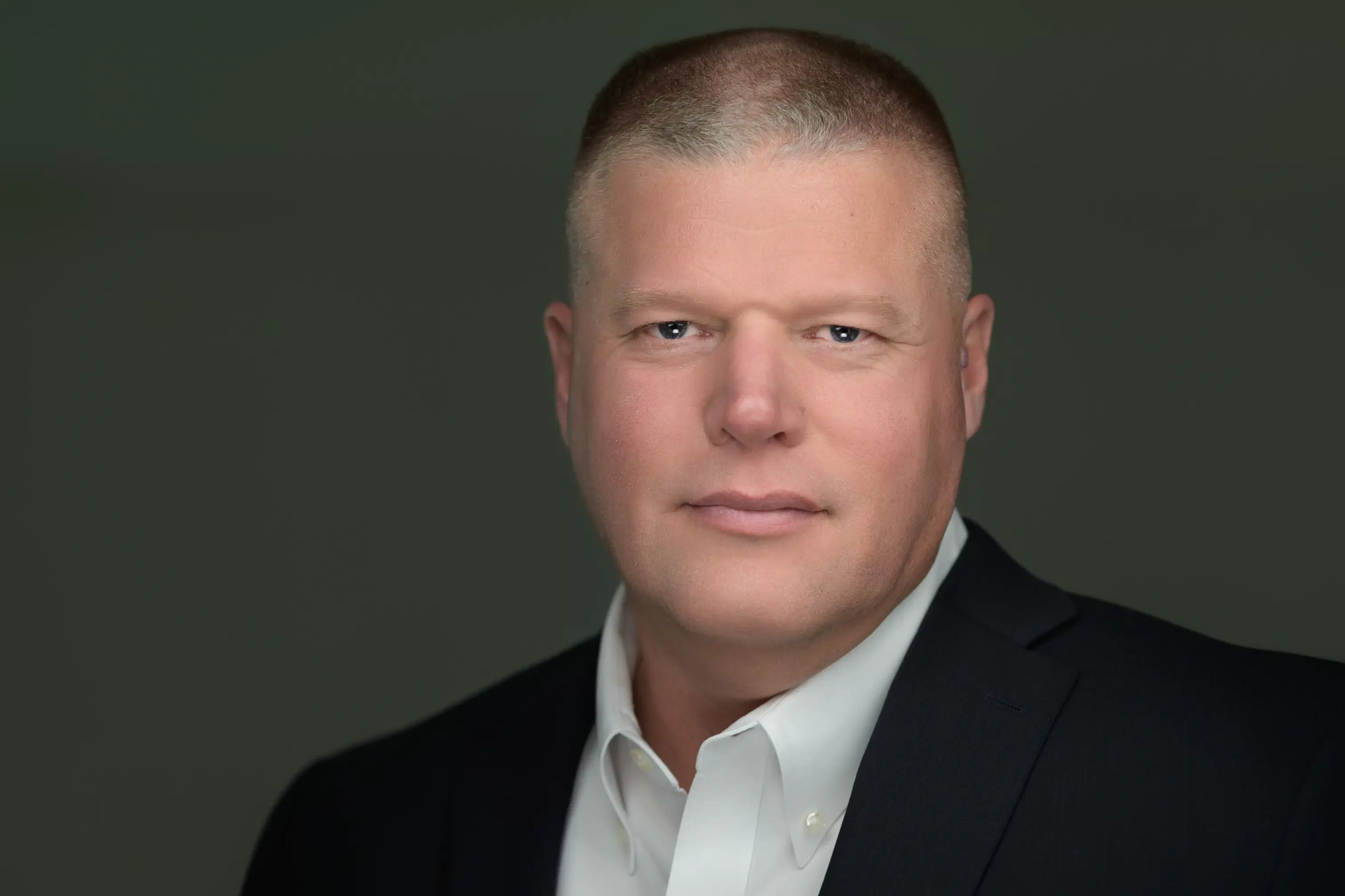 AI Headshots vs. Professional Photography: Which Is Better for Your Executive Brand?