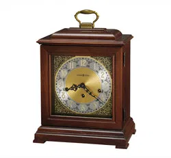 Classic Hermle mantel clock in polished dark wood